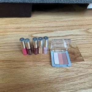Clinique lip glosses and powder blusher